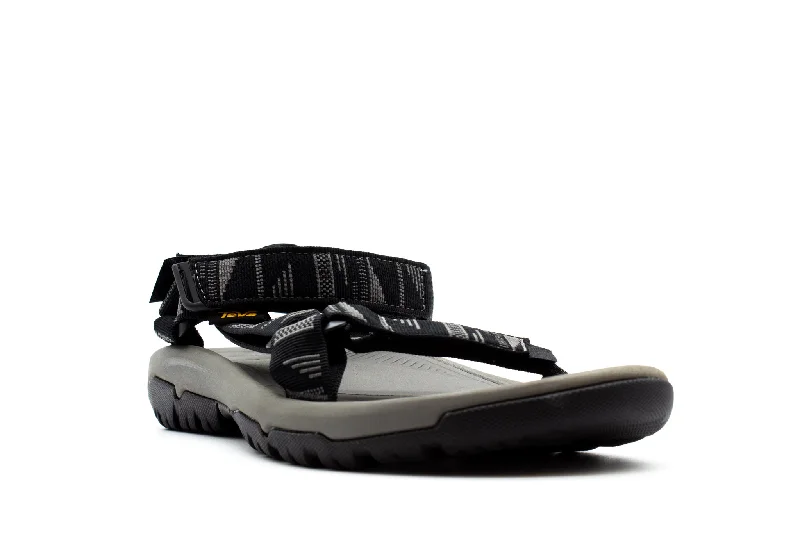 Men's sandals with a decorative buckle or charm Men's sandals with a decorative buckle or charm TEVA Hurricane