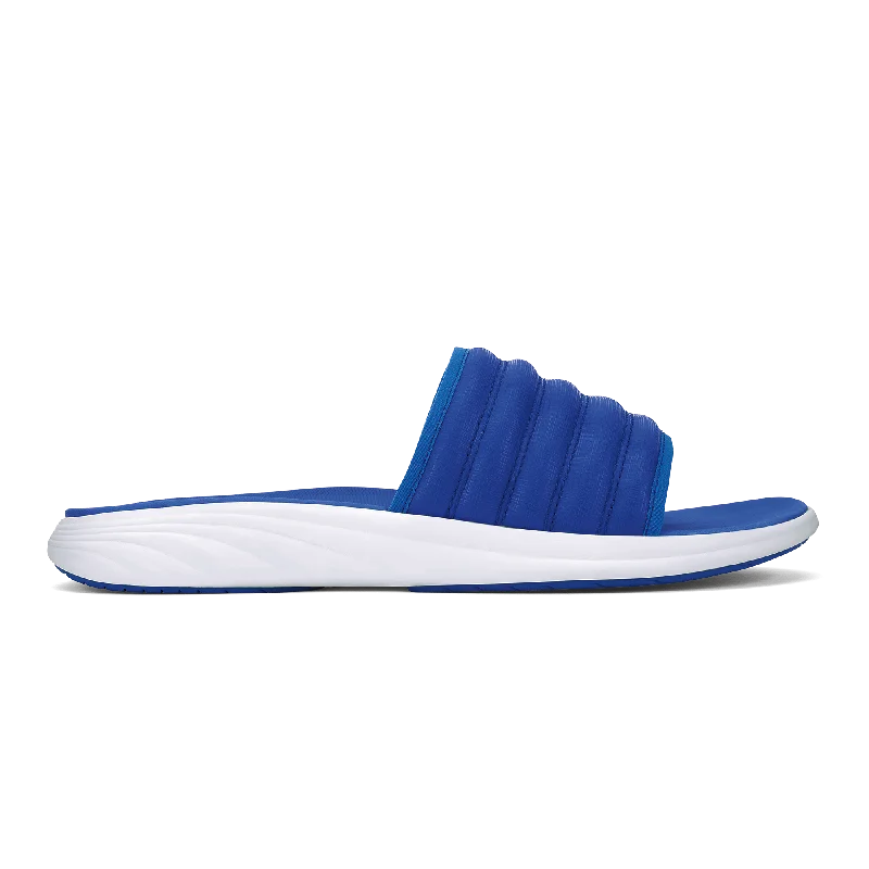 Men's sandals in a neutral color like black or brownKomo Slide - Sunset Blue