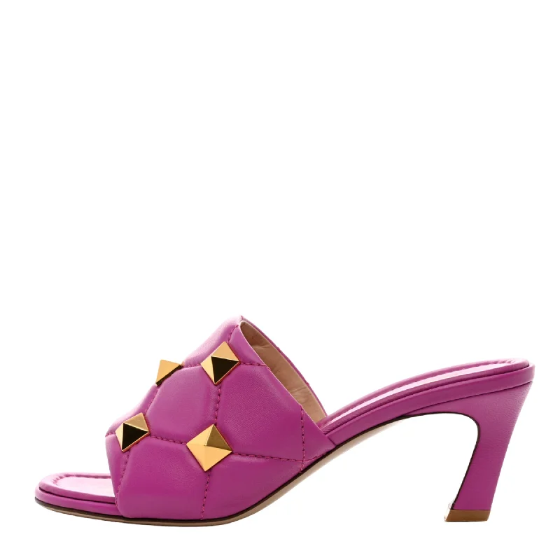 Men's sandals in a neutral color like black or brownValentino Garavani Roman Stud Leather Mules