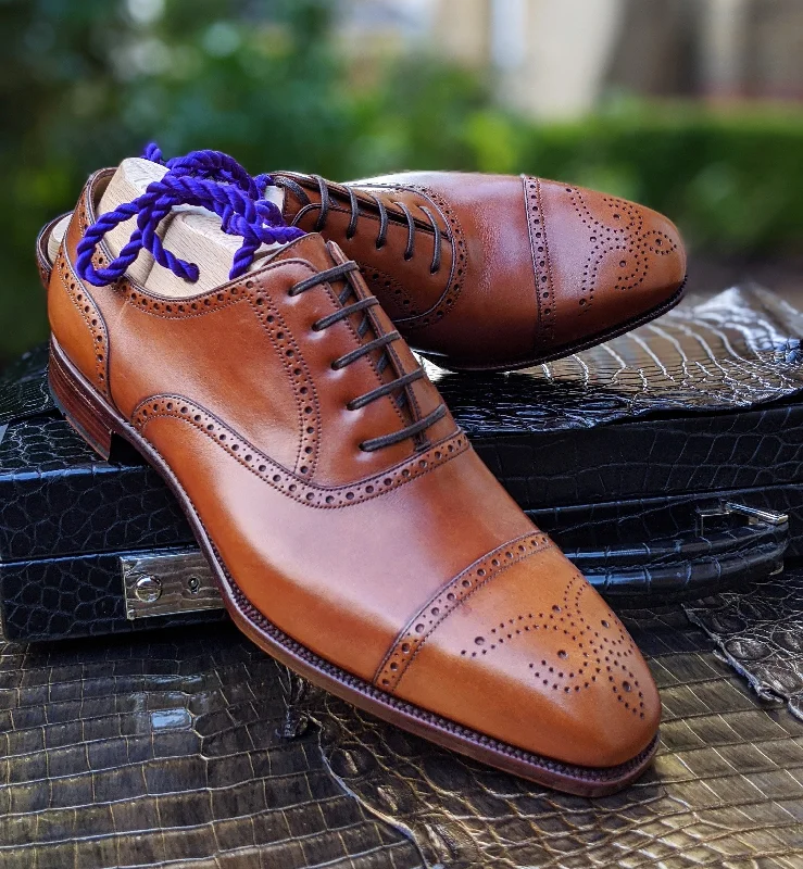 Men's Oxfords with a classic silhouette and a high - shine finishAscot Escobar - Cognac Calf
