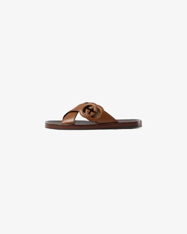 Men's slippers with a soft, flexible soleGucci Men's Interlocking G Slide Sandal