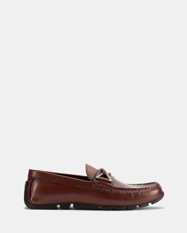 Men's loafers with a perforated leather upper for ventilationOswick Trim British Tan Leather