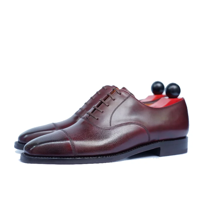 Men's Oxfords in a dark burgundy leather for a unique stylePuget - Sangria Calf