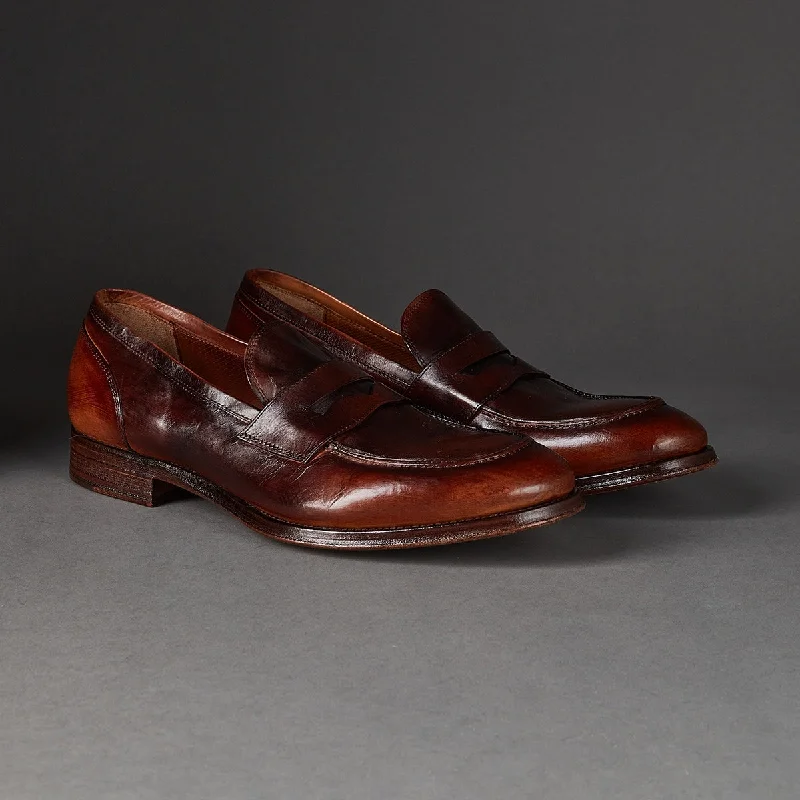 Men's loafers in a neutral color like black or brownRenato Tan